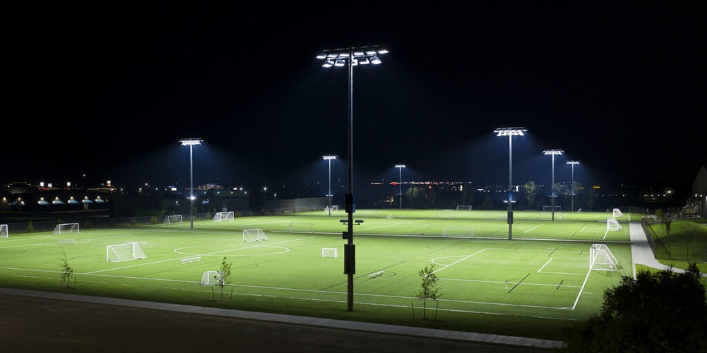 A stadium with new fields lights that were helped to be installed by commercial electricians.