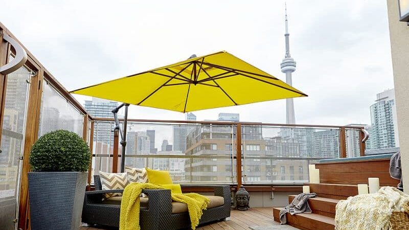 Hot tub and sauna that was rewired in Toronto with CN tower in the background.