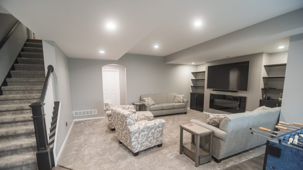 Basement with 4 pot lights installed that bring a lot light to an area with that used to be dark.