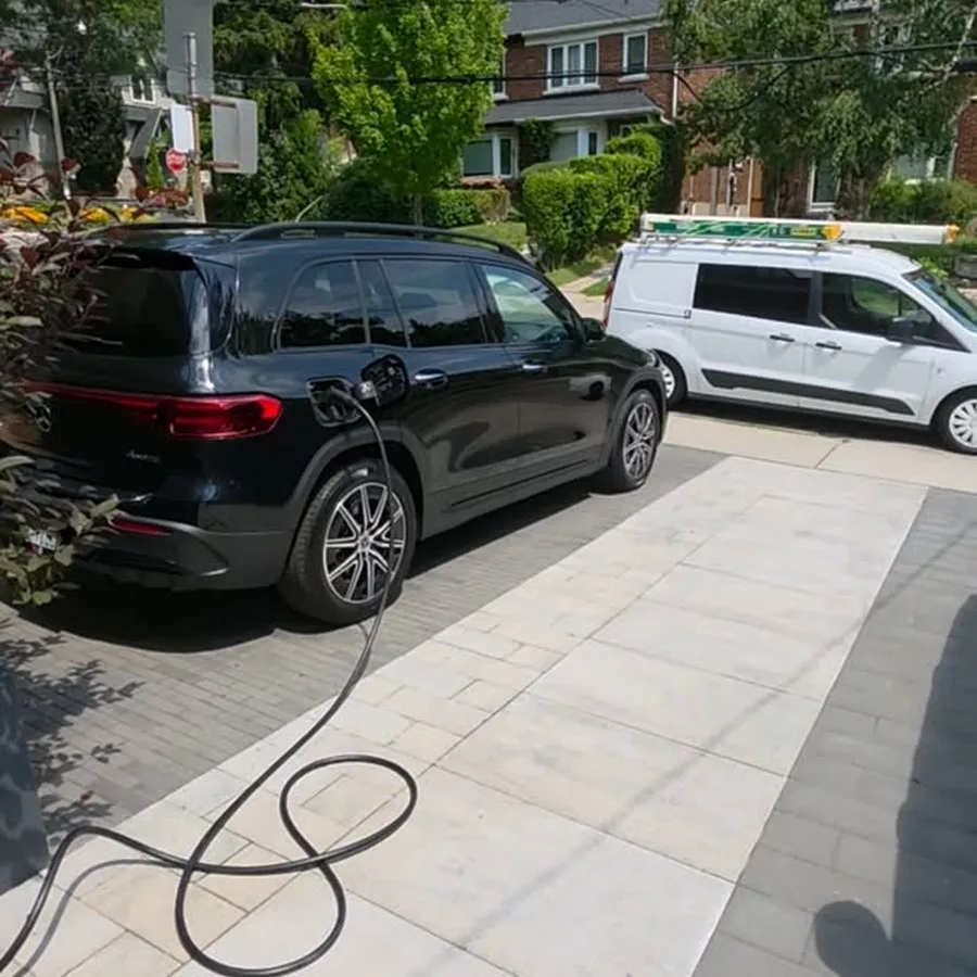 EV charger installation by 3e Electrical — black electric SUV charging on a paved driveway