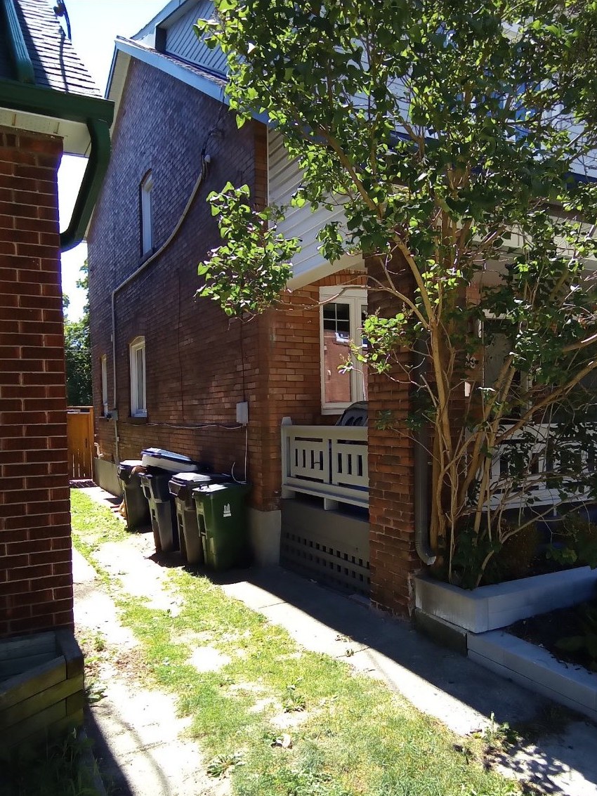 Example photo: where the car parks — the driveway beside the house